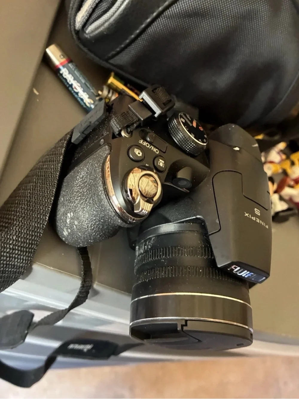Fujifilm FinePix S-series digital camera with travel case